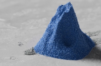 This image of a blue plastic pile represents the cumulative amount of plastic waste that would be generated between 2010 and 2050 — enough to cover the entire island of Manhattan, and ten times the height of the Empire State Building — under a business-as-usual scenario where no aggressive policy actions are taken.