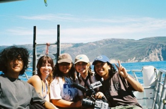 The "841" film crew (from left): director of photography Logan Asperian, sound mixer Lauren Barley, producer Macielle Villaseñor, director Rachel Burnett and editor Vincent Cuenco off the coast of Santa Cruz Island in 2023.